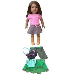 American girl Truly Me doll with brown eyes, extra pants, skirt, underwear & bag